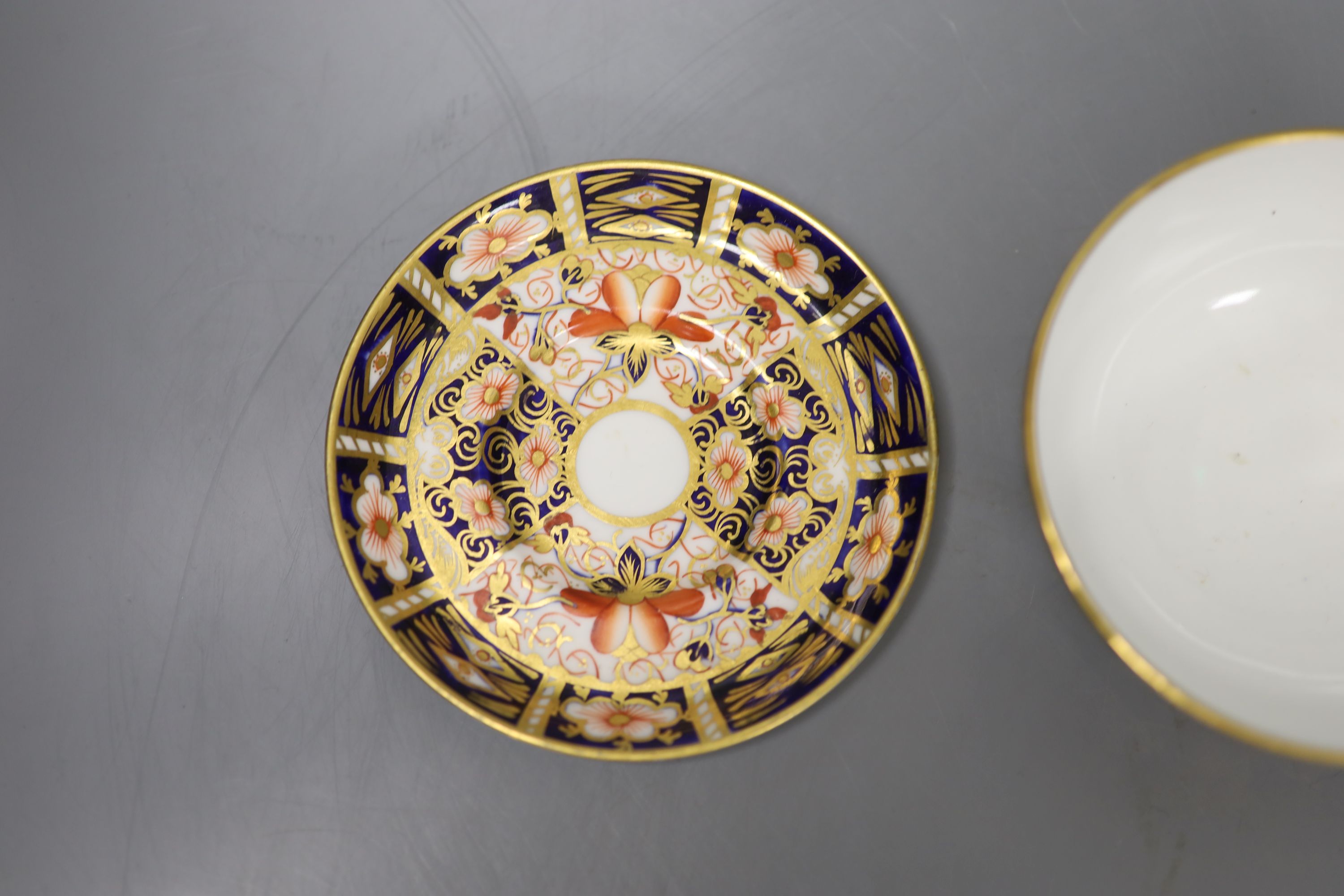 A pair of Royal Crown Derby coffee cups, imari pattern 2451, a coffee can and saucer and a sugar bowl